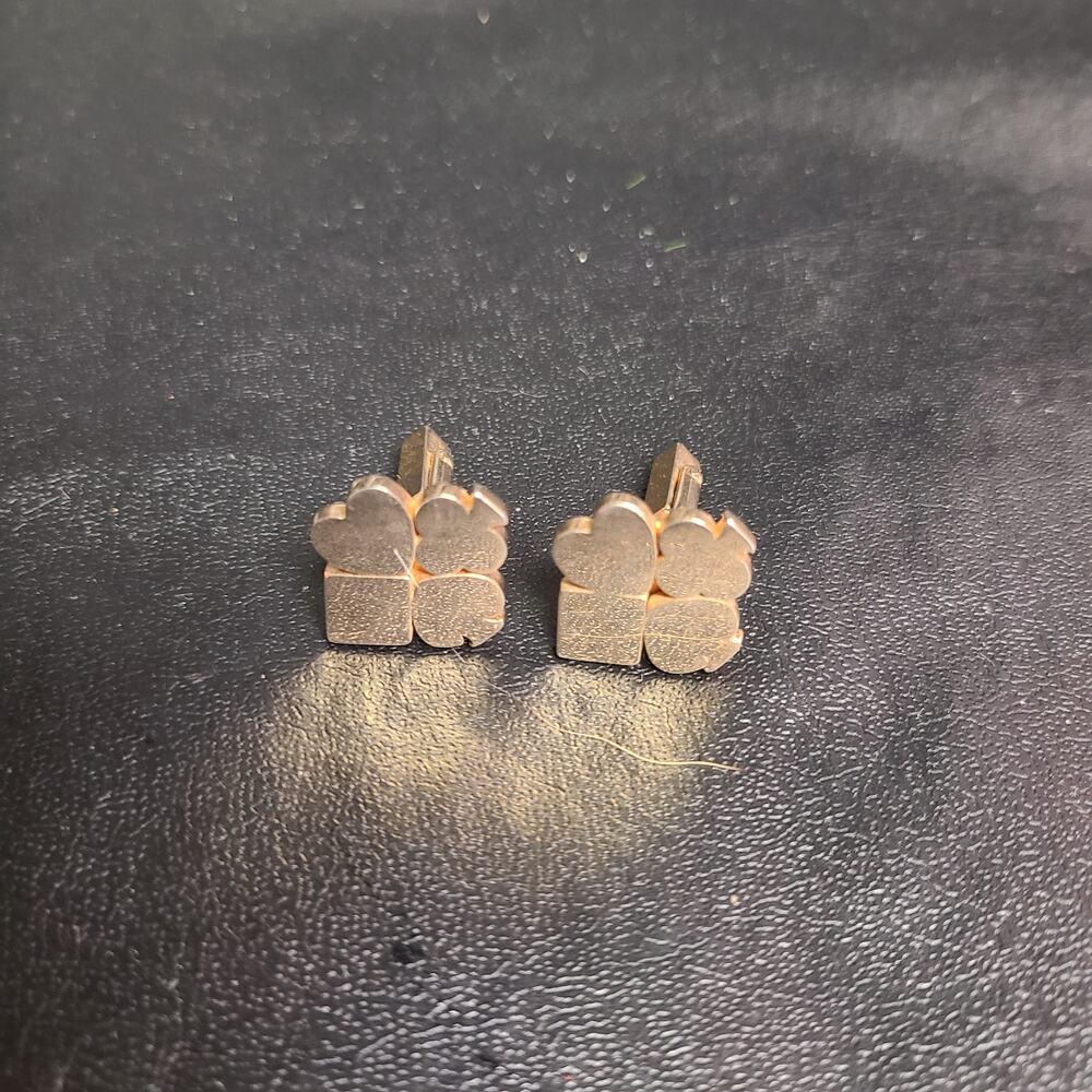 Vintage seventies Swank gold tone cuff links with card suit symbols